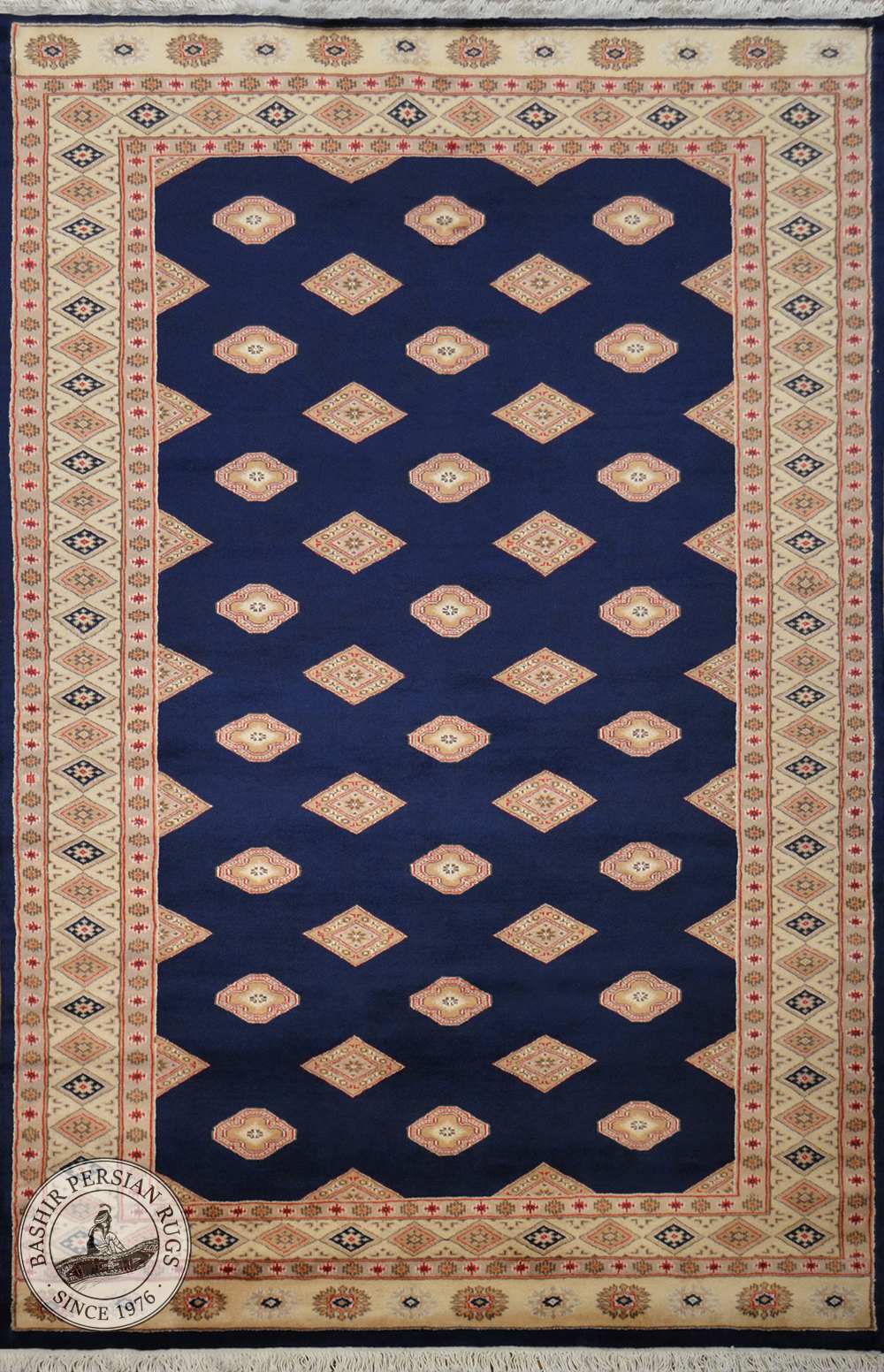 A hand-knotted Pakistani area rug called the Pende Bokhara and made of pure wool.
